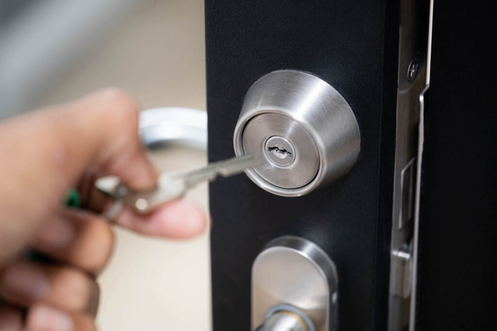 hand inserting key into door lock 2026 03 13 01 35 47 utc hand inserting key into door lock 2026 03 13 01 35 47 utc